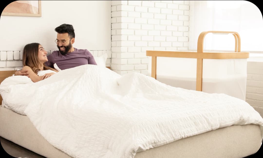Parent using the Cradlewise smart crib with confidence